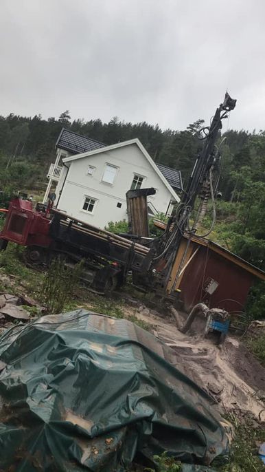 Boring av brønn ved hus