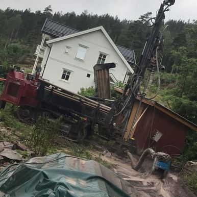 Boring av brønn ved hus